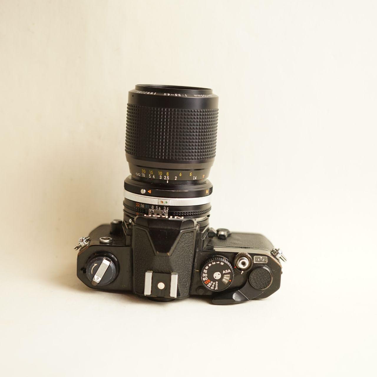 Nikon FM 35mm SLR Film Camera | Nikkor 35-105mm Lens | Tested & Working | Silver/Black