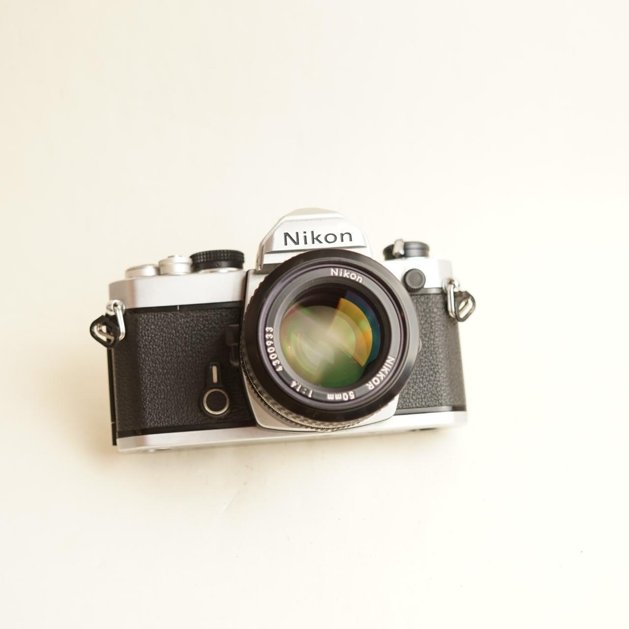 Nikon FM Film Camera + Nikon 50mm f/1.4 Lens | 35mm SLR | Tested & Working | Silver & Black