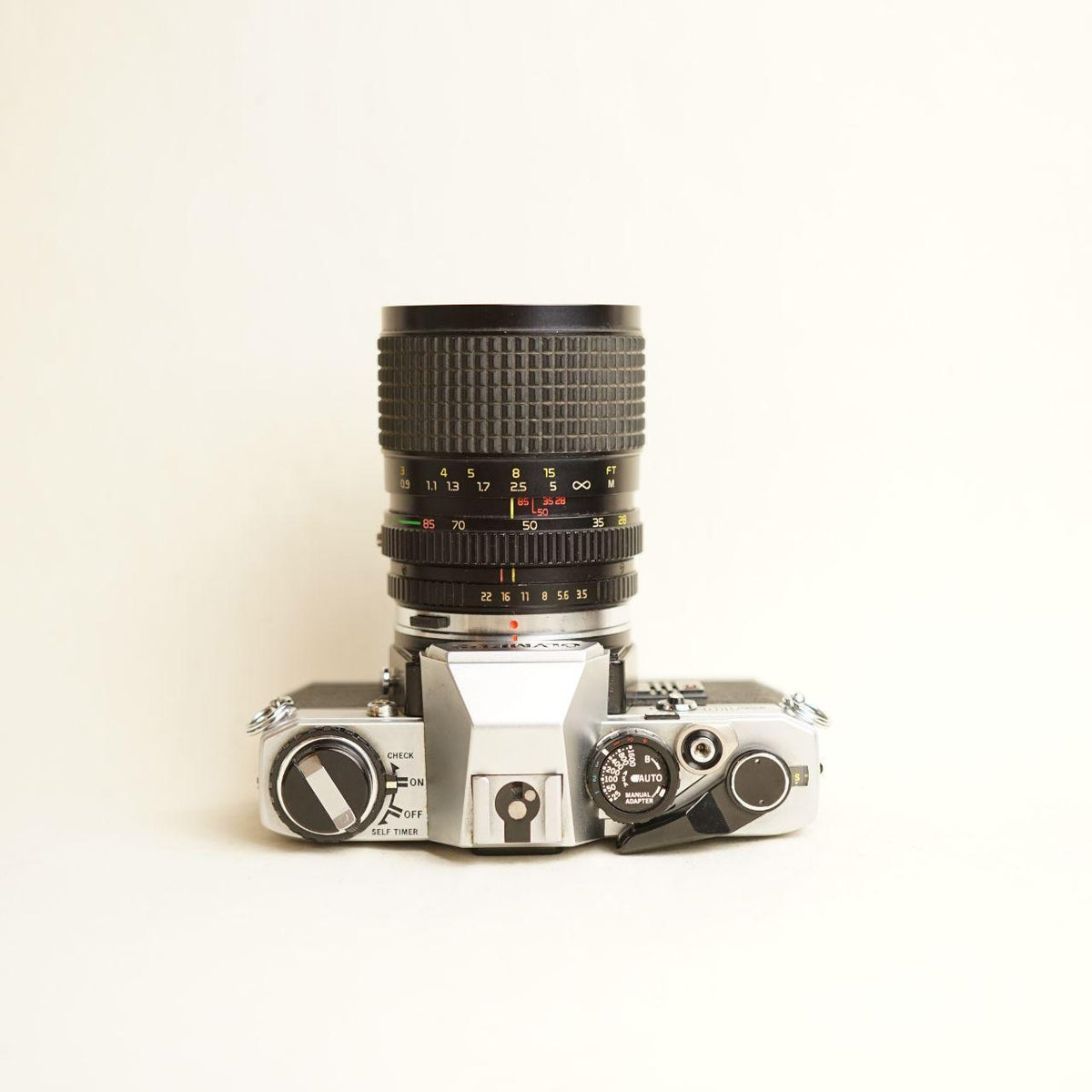 Olympus OM10 35mm Film Camera | Tokina AT-X 28-85mm f/3.5-4.5 Lens | B Condition