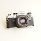 Olympus OM10 Film Camera + Olympus Auto-S 50mm f/1.8 Lens | 35mm SLR | Tested & Working | Silver & Black
