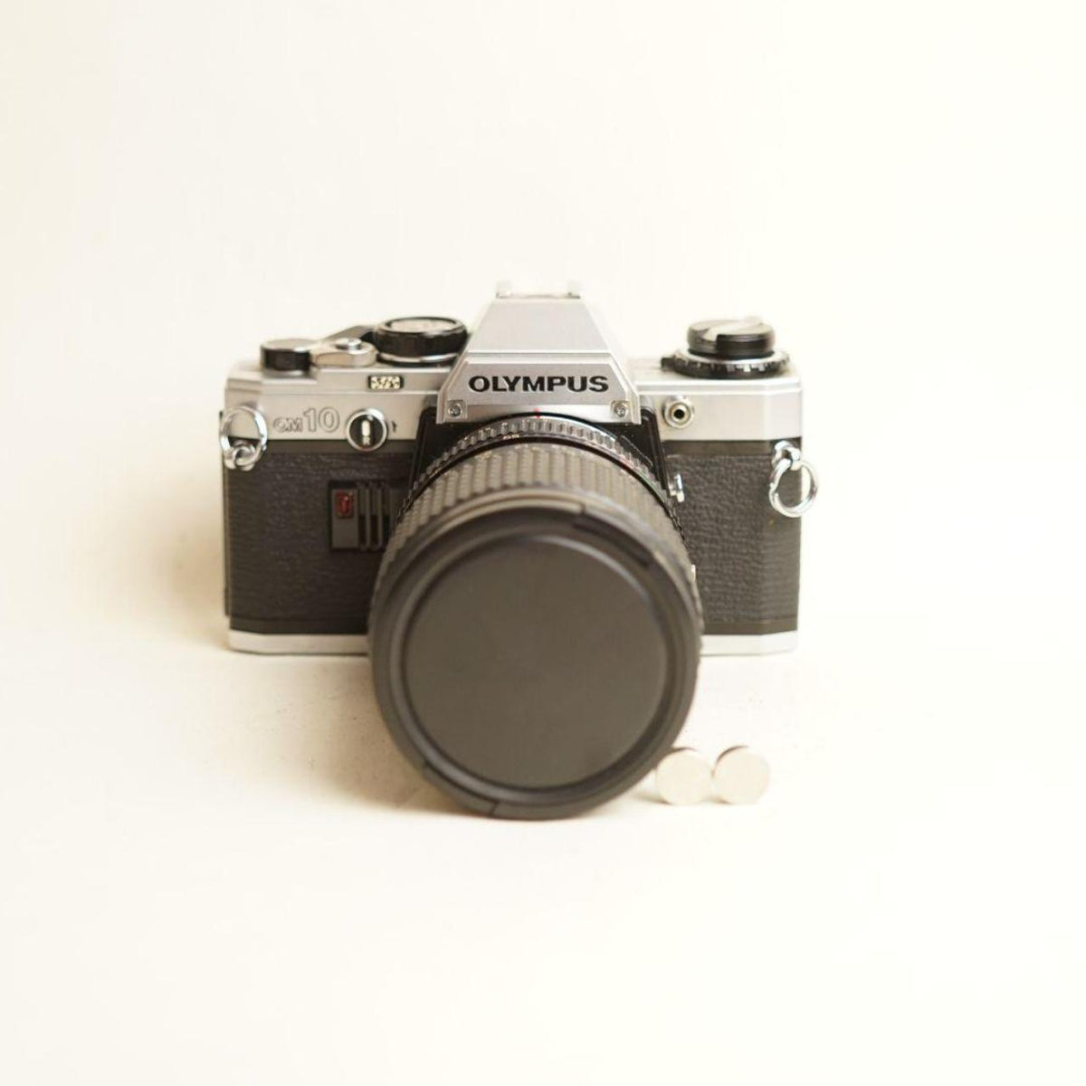 Olympus OM10 35mm Film Camera | Tokina AT-X 28-85mm f/3.5-4.5 Lens | B Condition