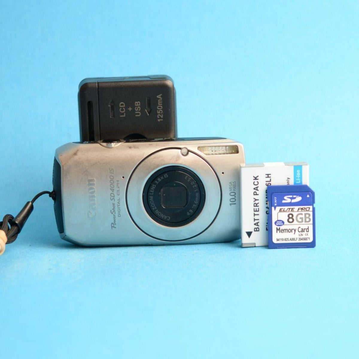 Canon PowerShot SD4000 IS Digital Camera | 10MP | Tested & Working | Silver
