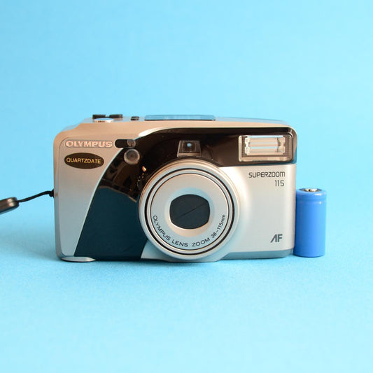 Olympus SuperZoom 115 | 35mm Point & Shoot | Tested & Working | Silver